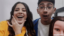 Ebony and a brunette are having sex with a nerd